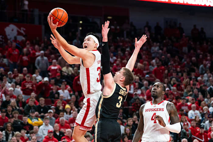 Nebraska guard Keisei Tominaga shoots the ball against Purdue  guard Braden Smith during the first half Tuesday night at Pinnacle Bank Arena in Lincoln. (Jan 9, 2024)